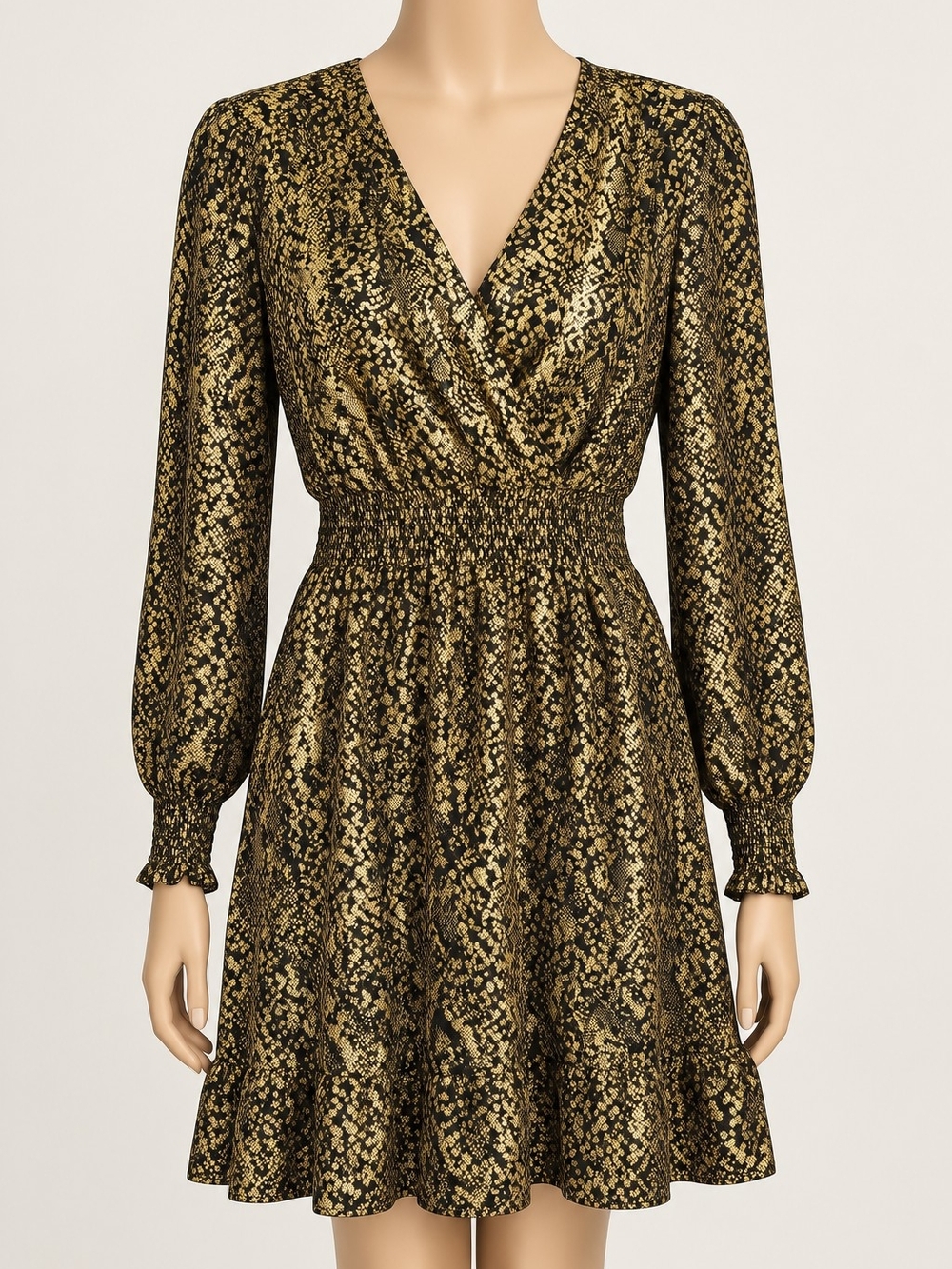 Metallic gold foil pattern, deep V-neckline, smocked elastic waist, long sleeves